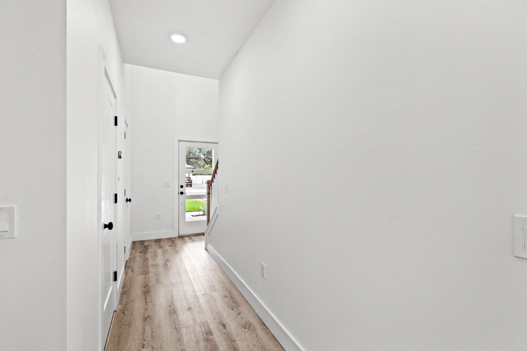 inside front door with long skinny hallway
